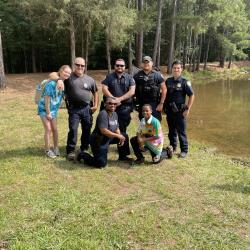 Officer group image at pond